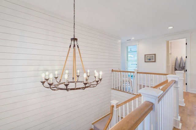 hallway with light hardwood / wood-style flooring