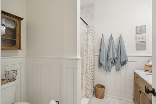 bathroom with vanity and a shower with shower curtain