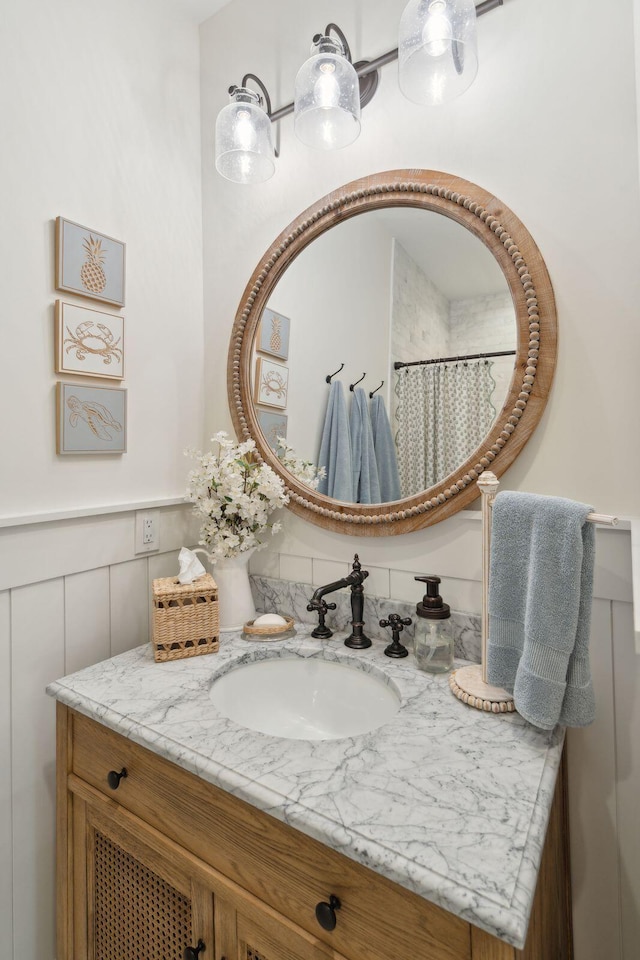 bathroom featuring vanity and walk in shower