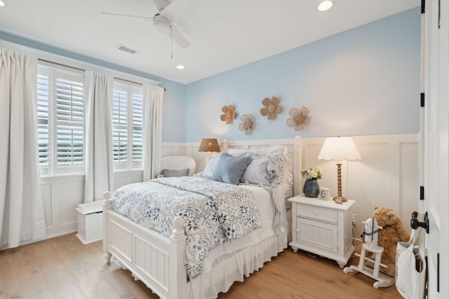 bedroom featuring ceiling fan and light wood-type flooring