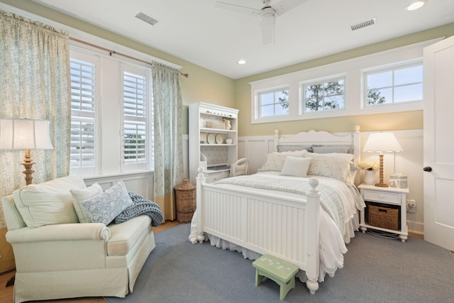 bedroom featuring ceiling fan and carpet floors