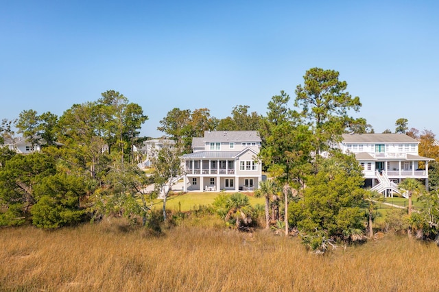 rear view of house with a sunroom