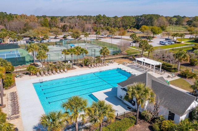 view of swimming pool featuring a pergola and a patio