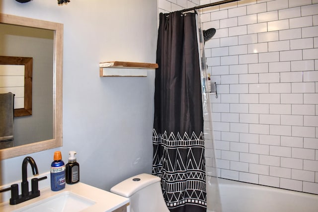 bathroom with toilet, shower / tub combo, and vanity