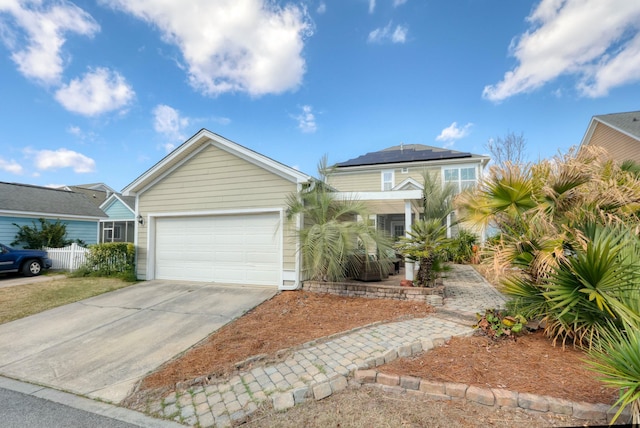 single story home featuring a garage