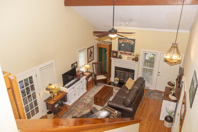 152 Mansfield Blvd, Charleston, SC 29418 - living area featuring crown molding, wood finished floors, ceiling fan, a fireplace, and a towering ceiling