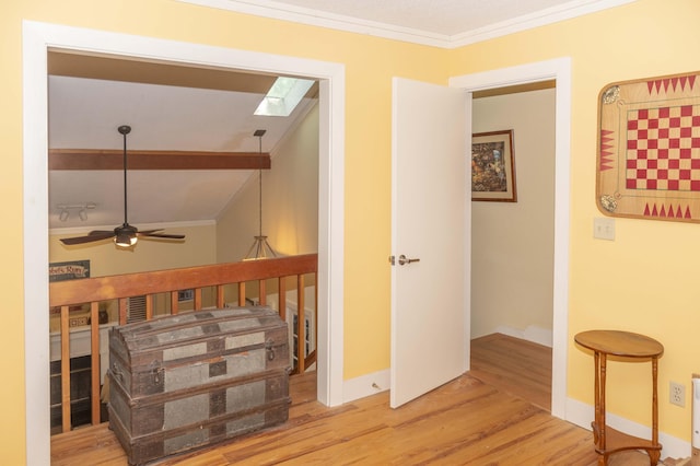 152 Mansfield Blvd, Charleston, SC 29418 - hallway with crown molding, wood finished floors, a skylight, lofted ceiling, and baseboards