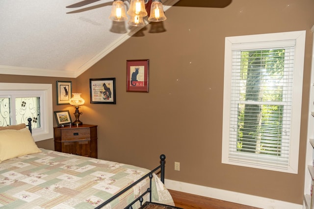 152 Mansfield Blvd, Charleston, SC 29418 - bedroom with vaulted ceiling, ornamental molding, ceiling fan, wood finished floors, and a textured ceiling