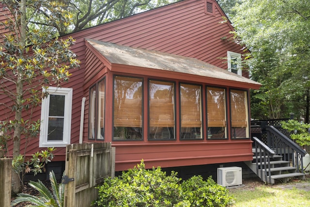 152 Mansfield Blvd, Charleston, SC 29418 - view of side of property with a sunroom and ac unit