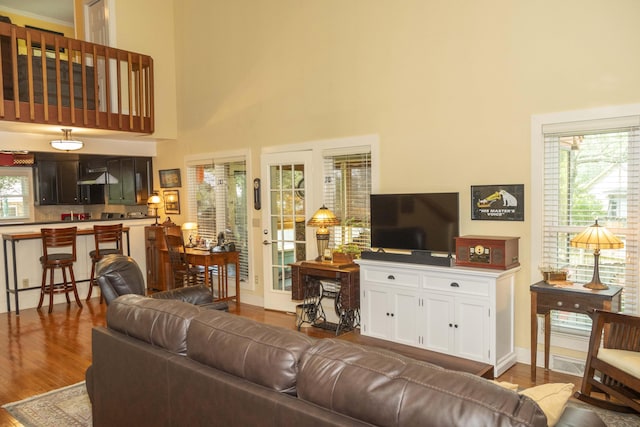 152 Mansfield Blvd, Charleston, SC 29418 - living room with a towering ceiling and wood finished floors