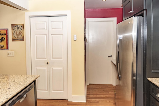 152 Mansfield Blvd, Charleston, SC 29418 - kitchen with stainless steel appliances, light wood-style flooring, and light stone countertops
