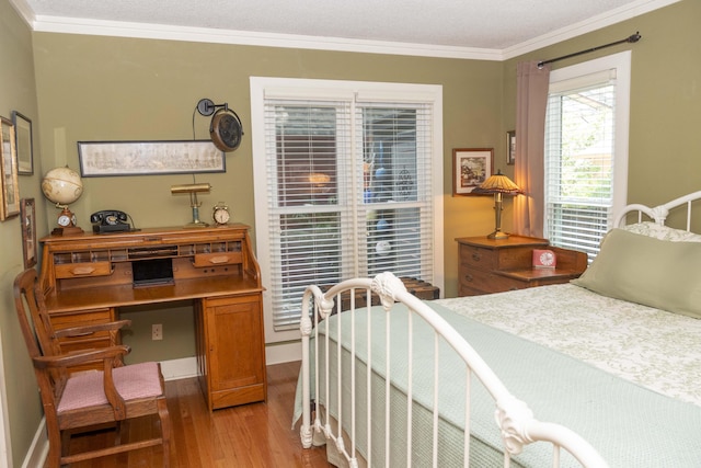 152 Mansfield Blvd, Charleston, SC 29418 - bedroom with light wood-style flooring, crown molding, and baseboards