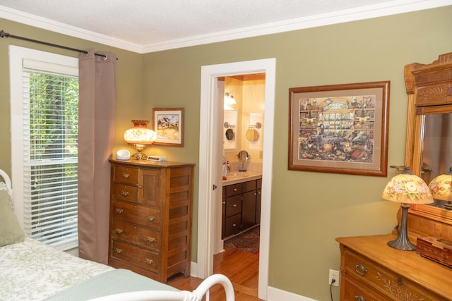 152 Mansfield Blvd, Charleston, SC 29418 - bedroom featuring wood finished floors, crown molding, and ensuite bathroom