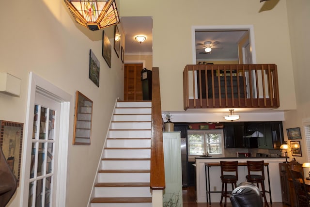 152 Mansfield Blvd, Charleston, SC 29418 - staircase with a ceiling fan and a towering ceiling