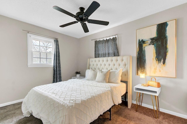 carpeted bedroom with baseboards and a ceiling fan