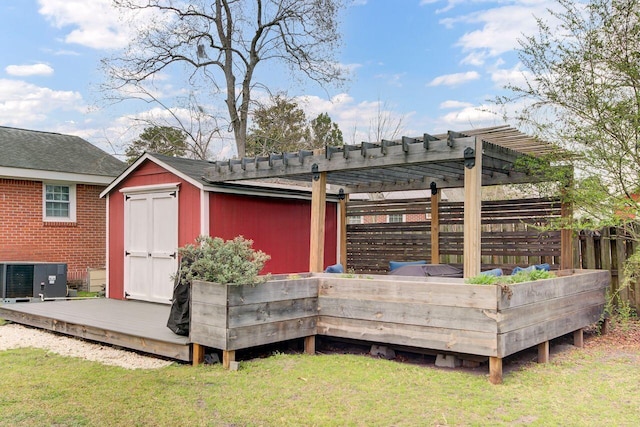 view of shed featuring a pergola and central AC