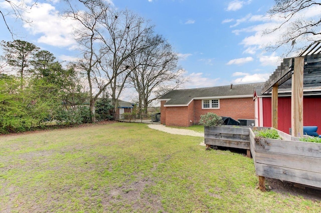 view of yard featuring a pergola, a deck, and fence