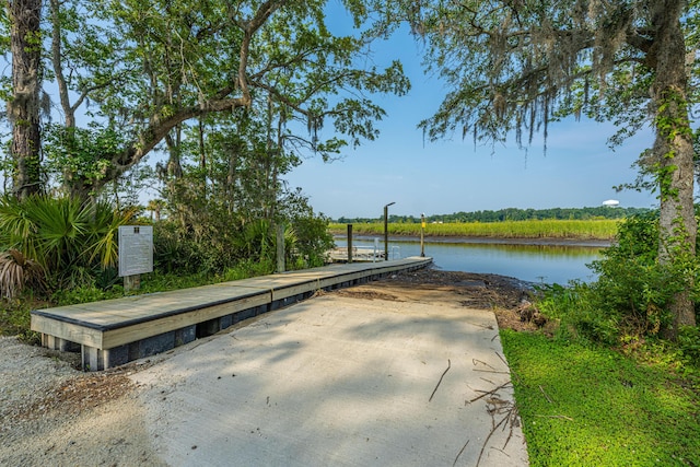 view of dock with a water view