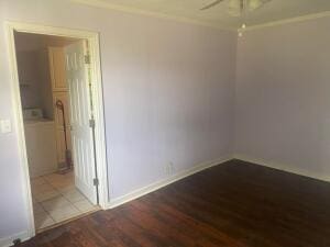 spare room featuring hardwood / wood-style floors