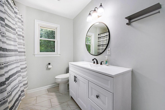 bathroom with vanity, toilet, curtained shower, and marble finish floor