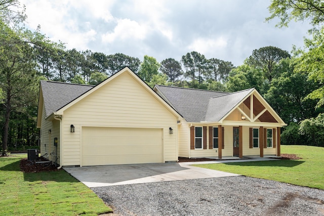 view of front of house featuring a front yard, cooling unit, a shingled roof, concrete driveway, and an attached garage