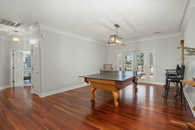 rec room with french doors, ornamental molding, and dark wood-type flooring