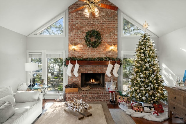 living room featuring a fireplace, hardwood / wood-style flooring, and plenty of natural light