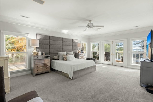 bedroom featuring french doors, crown molding, ceiling fan, access to exterior, and light colored carpet