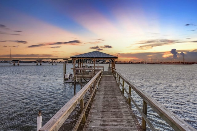 dock area featuring a water view