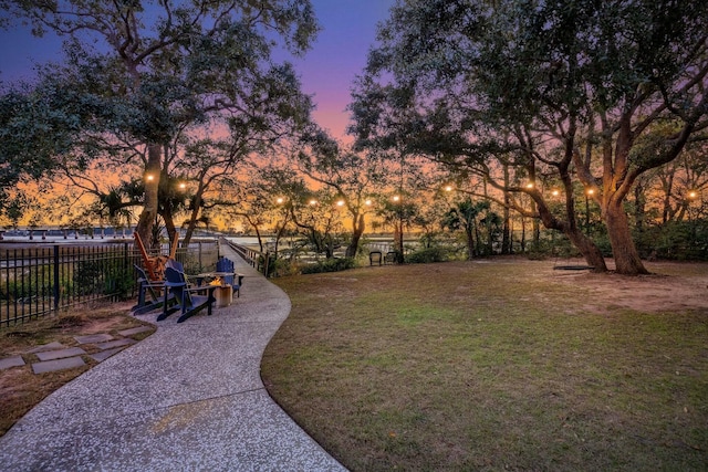 view of yard at dusk