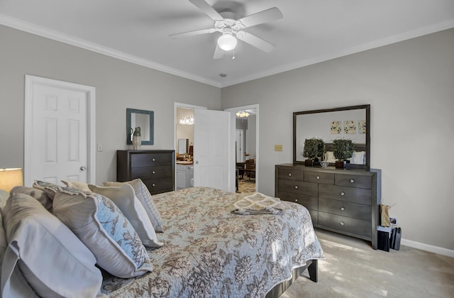 bedroom with baseboards, a ceiling fan, light colored carpet, ornamental molding, and ensuite bathroom