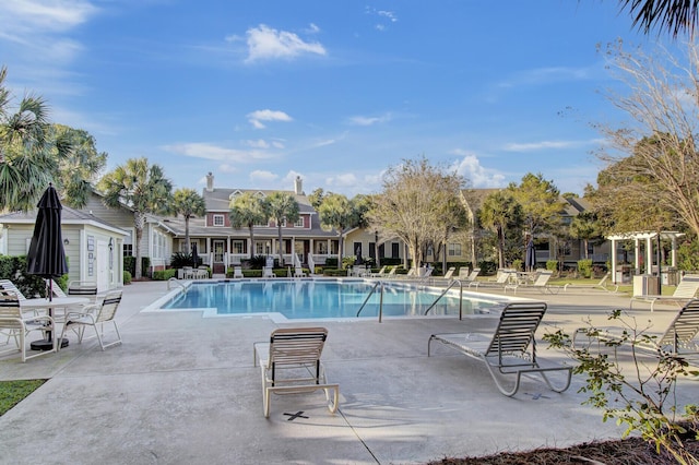 community pool with a patio