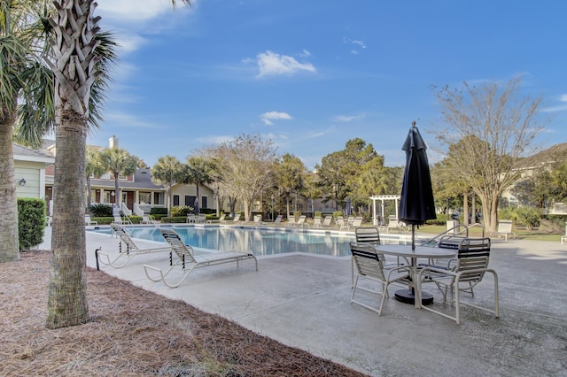 pool with a patio