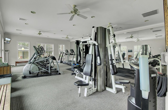 exercise room featuring recessed lighting, visible vents, and ornamental molding