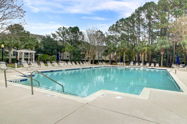 pool featuring a patio area