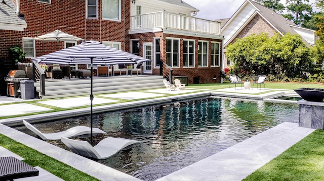 outdoor pool with a patio