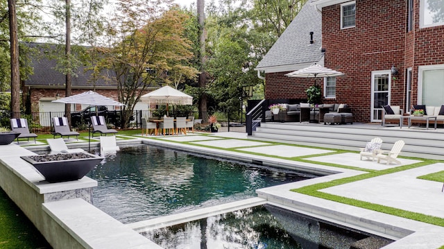 view of swimming pool featuring an outdoor living space, a fenced in pool, a hot tub, and fence