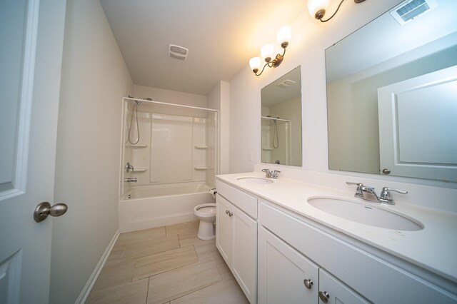 full bathroom featuring double vanity, tile patterned flooring,  shower combination, and toilet