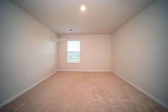 spare room with carpet