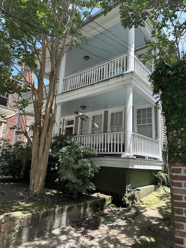 exterior space featuring a balcony