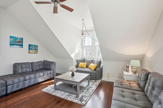 living room featuring a ceiling fan, lofted ceiling, baseboards, and hardwood / wood-style flooring