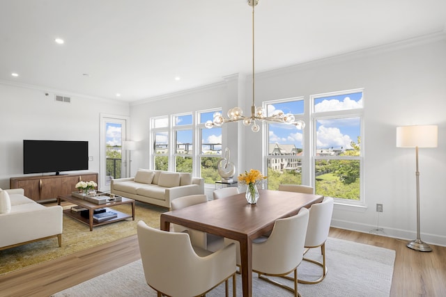 145 Pier View St Unit 407, Charleston, SC 29492 - dining area featuring crown molding, light wood finished floors, recessed lighting, a chandelier, and baseboards