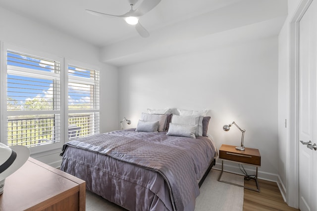 145 Pier View St Unit 407, Charleston, SC 29492 - bedroom featuring wood finished floors, baseboards, and a ceiling fan