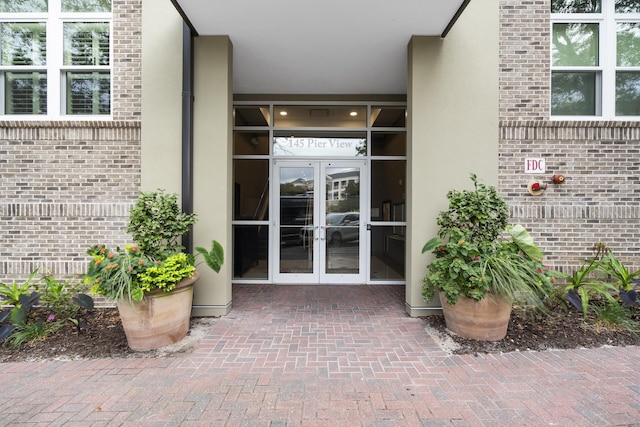 145 Pier View St Unit 407, Charleston, SC 29492 - doorway to property with french doors and brick siding