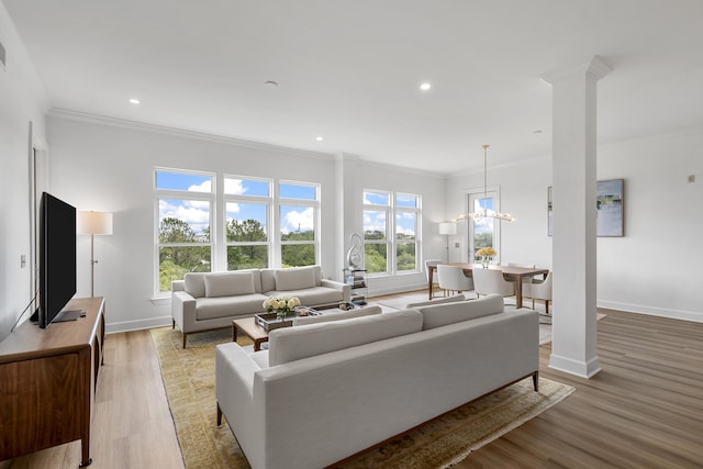145 Pier View St Unit 407, Charleston, SC 29492 - living area featuring ornamental molding, baseboards, light wood finished floors, recessed lighting, and a chandelier