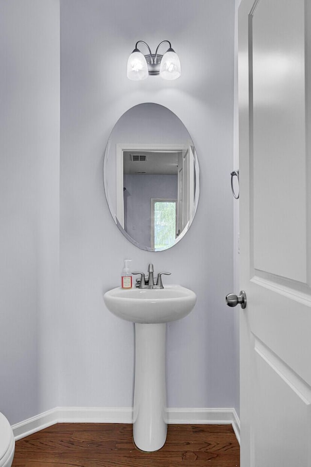123 Blackwater Way, Moncks Corner, SC 29461 - half bath with wood finished floors and baseboards