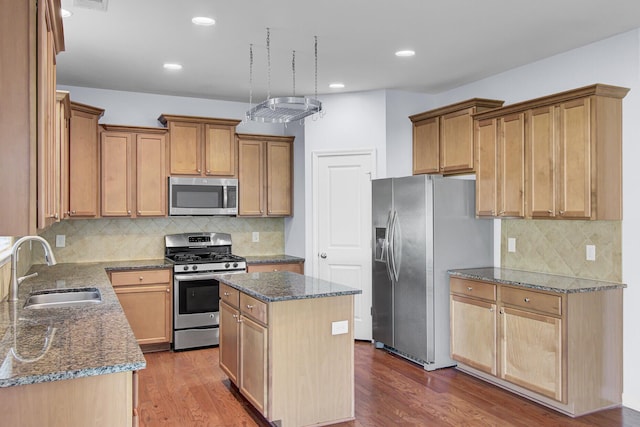 123 Blackwater Way, Moncks Corner, SC 29461 - kitchen featuring stainless steel appliances, dark stone counters, tasteful backsplash, dark wood-style floors, and recessed lighting