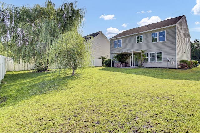 123 Blackwater Way, Moncks Corner, SC 29461 - rear view of house with a fenced backyard and a pergola