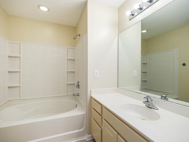 bathroom featuring bathing tub / shower combination and vanity