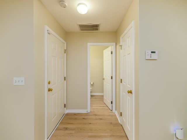 hall featuring light hardwood / wood-style flooring